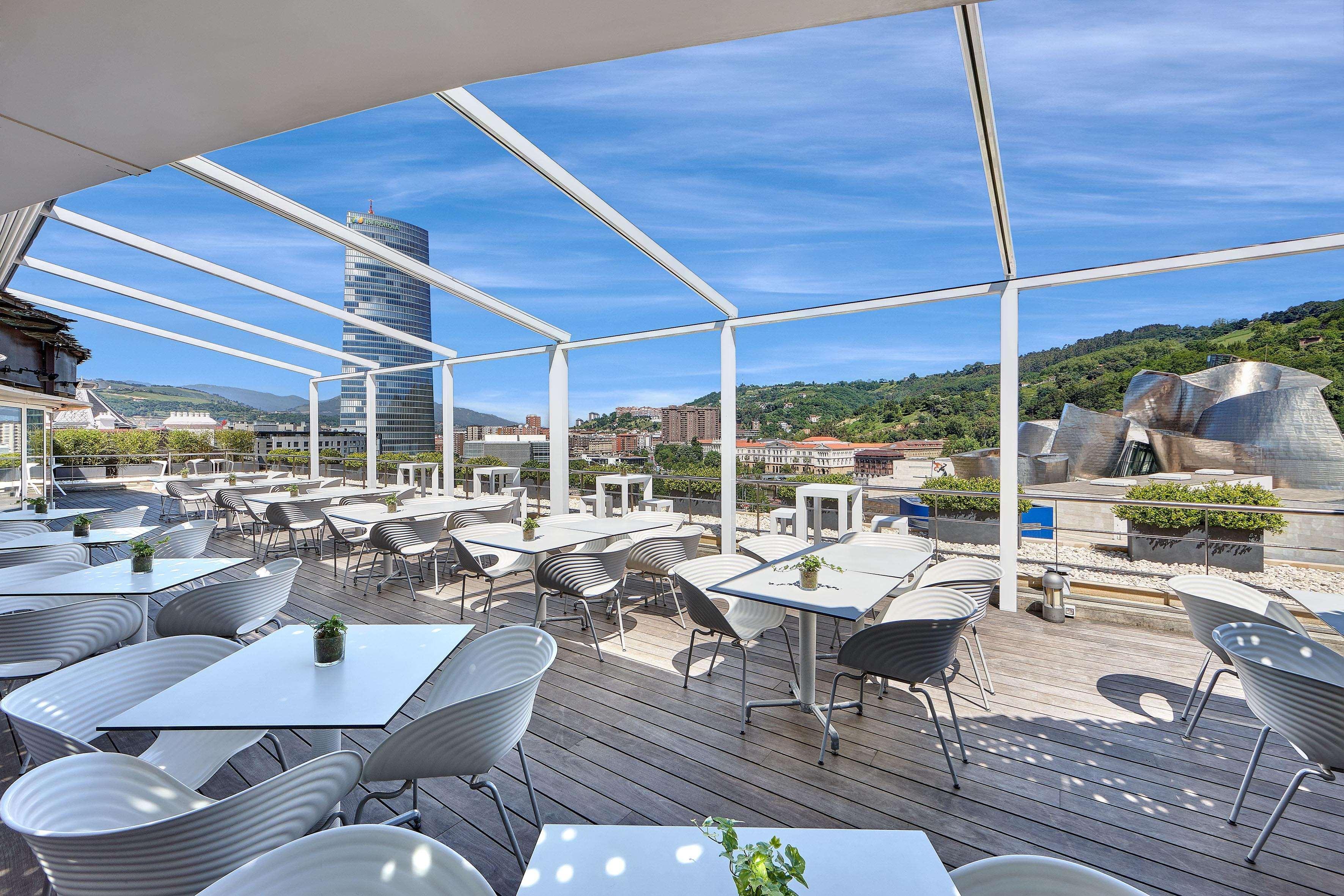 The Artist Grand Hotel Of Art Bilbao Exterior photo The restaurant on the roof