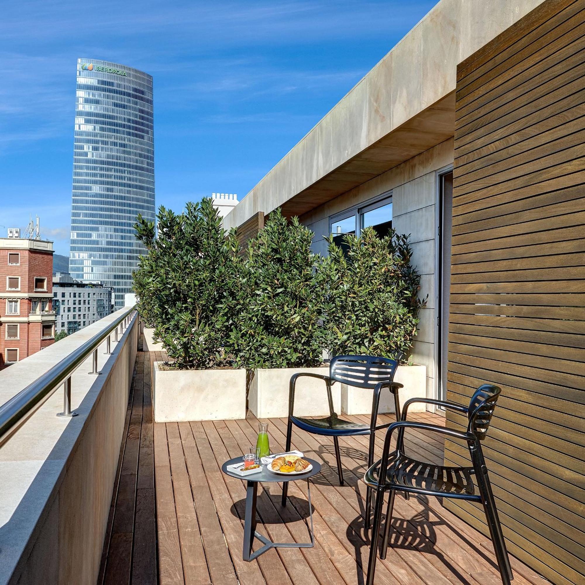 The Artist Grand Hotel Of Art Bilbao Exterior photo A balcony in Madrid, Spain